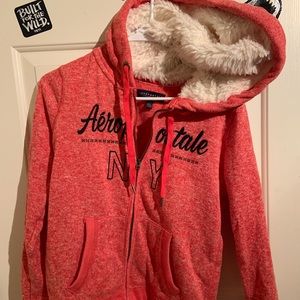 Zip up jacket with fuzzy hood